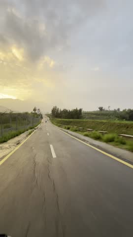 Scenic Road Under Beautiful Cloudy Sky Landscape

A peaceful and cinematic view of a road surrounded by beautiful clouds and natural scenery, creating a calm and visually stunning outdoor landscape.