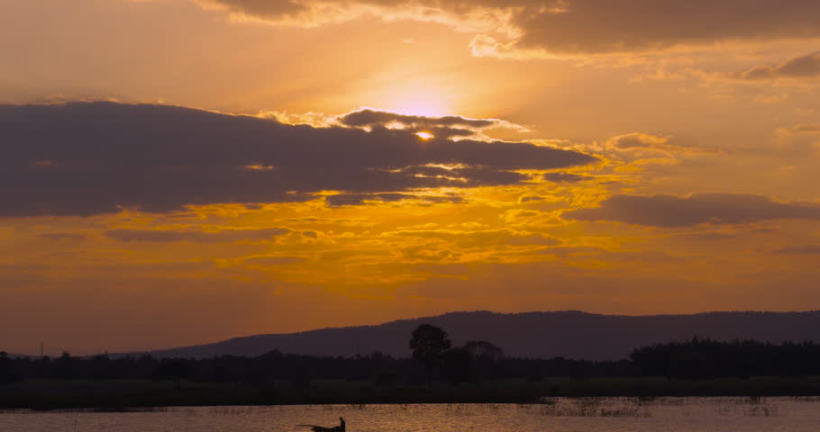 DCI4K ProRes422 Scene of Landscape of sunset over sea and mountain under sky golden clouds