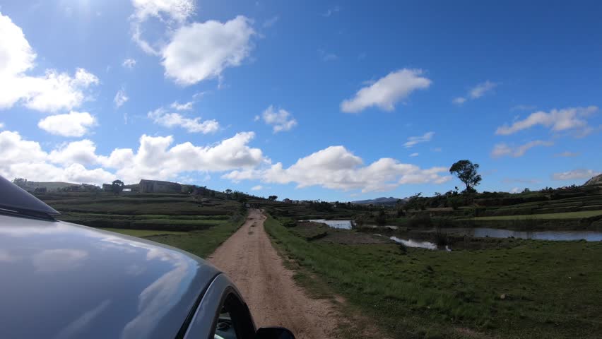 Cinematic road trip through Madagascar with smooth motion travel footage and scenic countryside landscapes