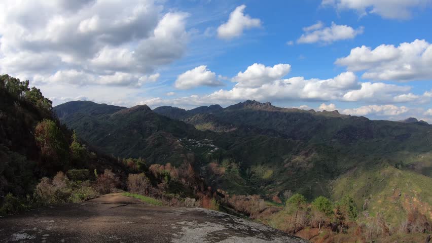 Scenic hiking trail through remote highland villages and countryside landscapes in Madagascar cinematic video