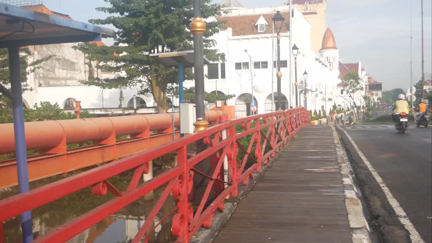 Surabaya, Indonesia - May 16, 2026: Red Bridge. A historic building in the old town. A tourist destination in downtown Surabaya.