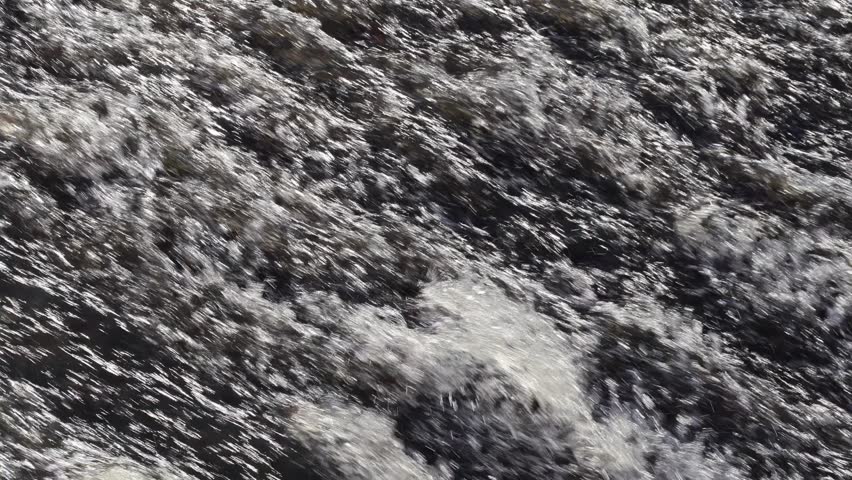 Fast flowing water on a water fall.