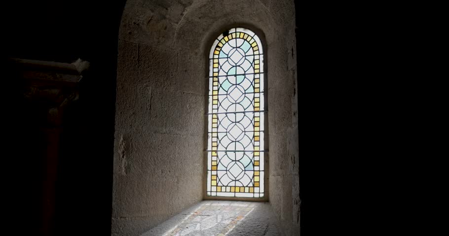 Stained Glass Light in Stone Chapel.