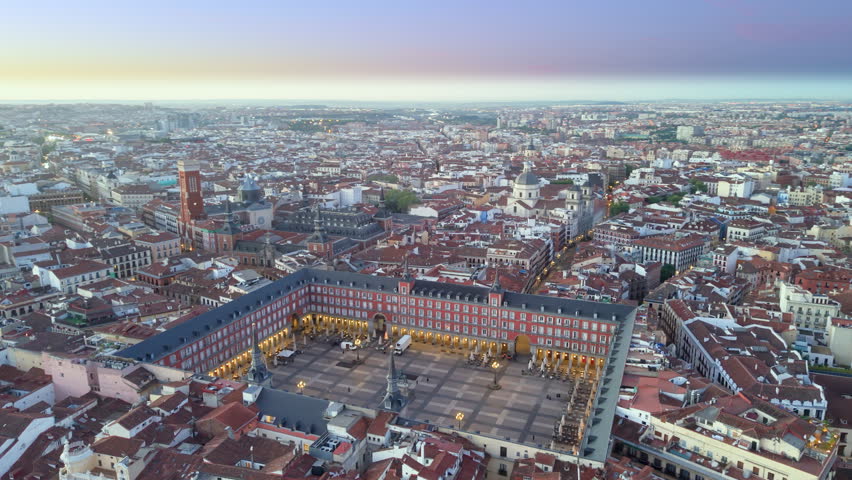 Aerial view of Plaza Mayor At Madrid. Spain. Medieval Buildings Landscape. Downtown District. Madrid At Community Of Madrid Spain. 