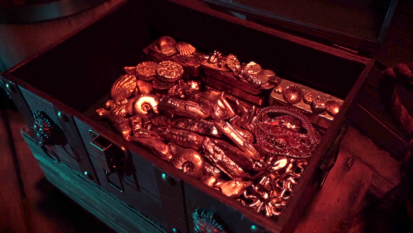 Gold treasure inside an old chest.
