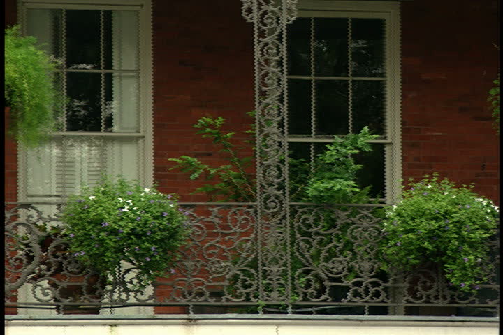 Pan across iron balconies in New Orleans.