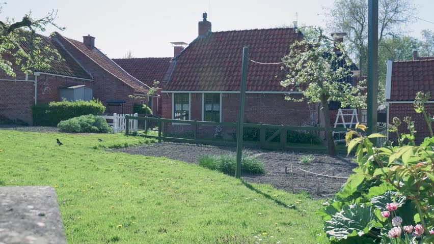 Traditional red brick house in a picturesque village