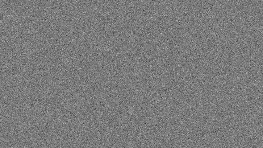 Heavy vintage 8mm film grain noise texture overlay on black background seamless loop