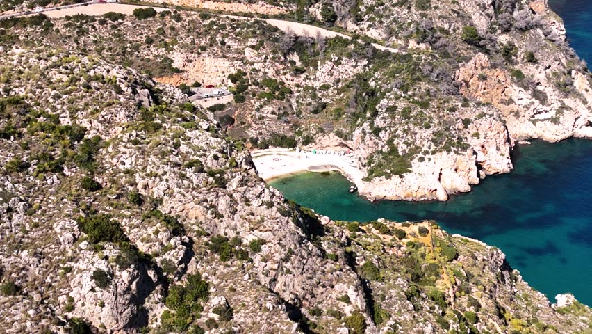 Scenic rocky coast and turquoise sea along Spain’s stunning coastline.
