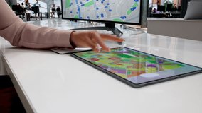 Urban Planner Reviews Zoning Map On Tablet For City Development Project. - Powered by Shutterstock - Get 15% off with code: PIKWIZARD15