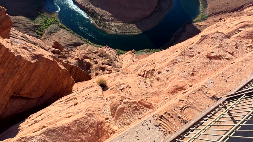 Breathtaking high angle perspective revealing the iconic horseshoe bend on the colorado river, a famous geological meander nestled within the dramatic orange sandstone cliffs of arizona