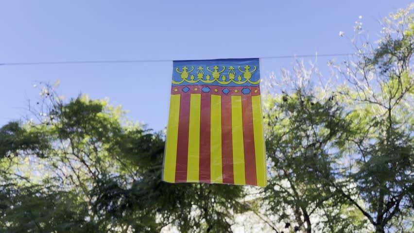 Valencia City Flag Displayed on Historic Street in Spain