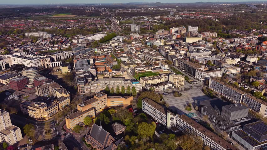 Aerial panoramic view above the city Heerlen beside the downtown on a sunny afternoon in the Netherlands.