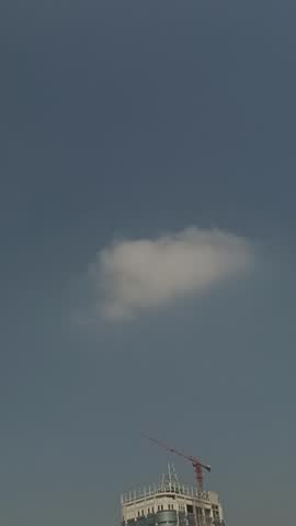 Natural landscape featuring small cumulus clouds and beautiful blue sky.