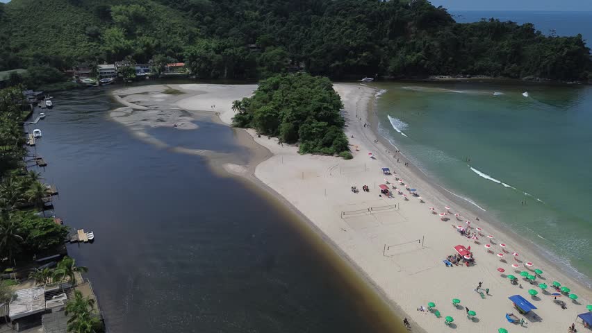 beach and river and people and boat