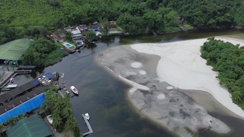 Beach and river and boats
