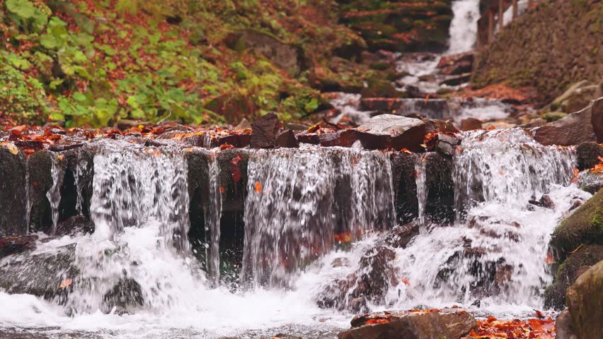 Beautiful Waterfall Shipot close-up in the autumn forest