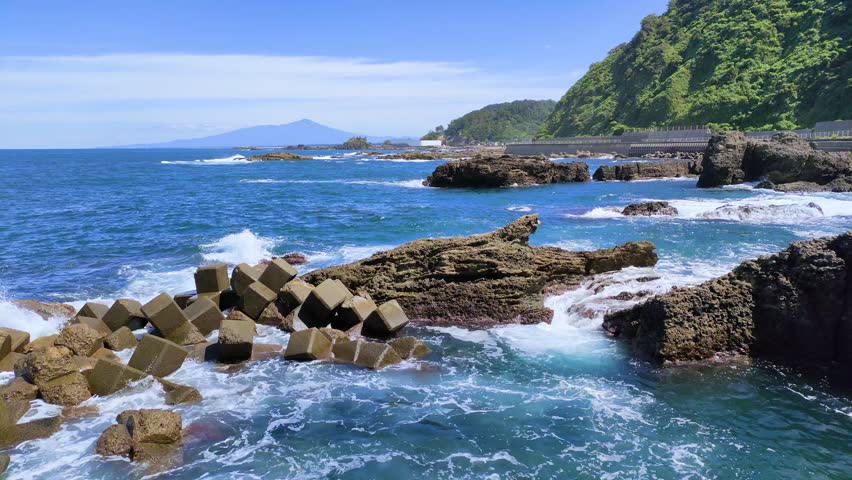 The Shonai Coastline of the Sea of Japan with Mount Chokai visible in the far distance