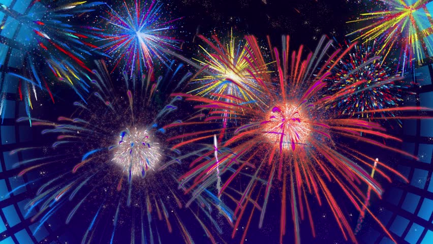 Vibrant fireworks explode in night sky with colorful lights and sparks
