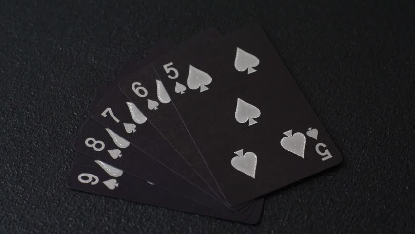 Playing card game poker in casino with chips, bets and risk