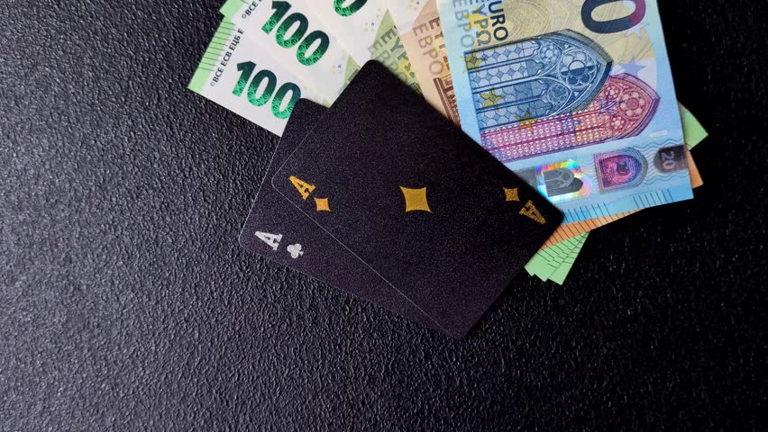 Playing blackjack or baccarat card game in casino with chips, bets and risk