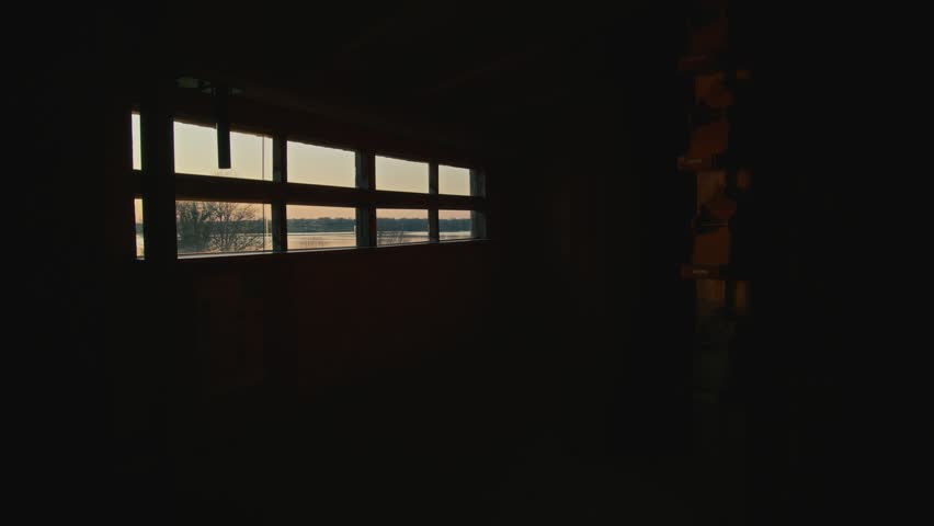 Peaceful lake in nature during golden hour with warm sunlight