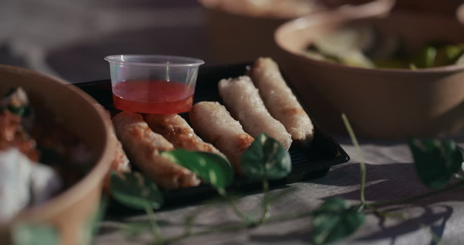 Spring rolls with dipping sauce served at Kvatric Market in Zagreb Croatia.