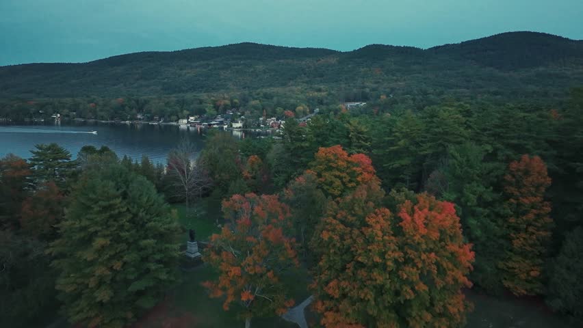 Adirondack Mountain, New York State. Aerial view of autumnal landscape with lake and forested area during twilight.