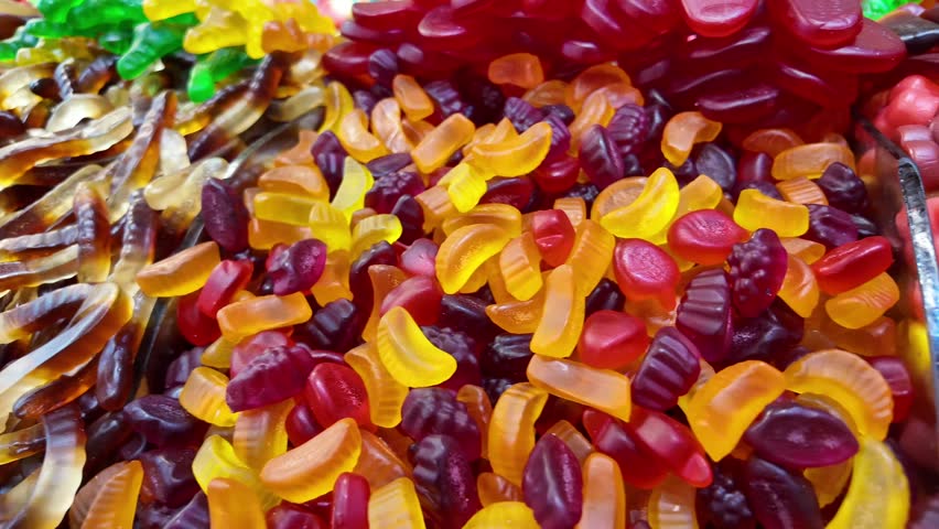 Colorful gummy candies displayed at a candy shop