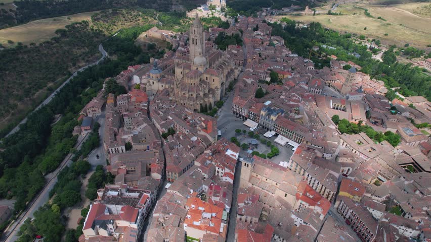 Aerial view around the old town of the city Segovia in Spain on a sunny summer noon.
