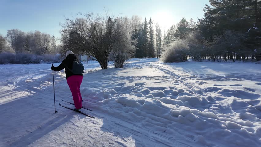A walk in the winter snow park. Slowmotion