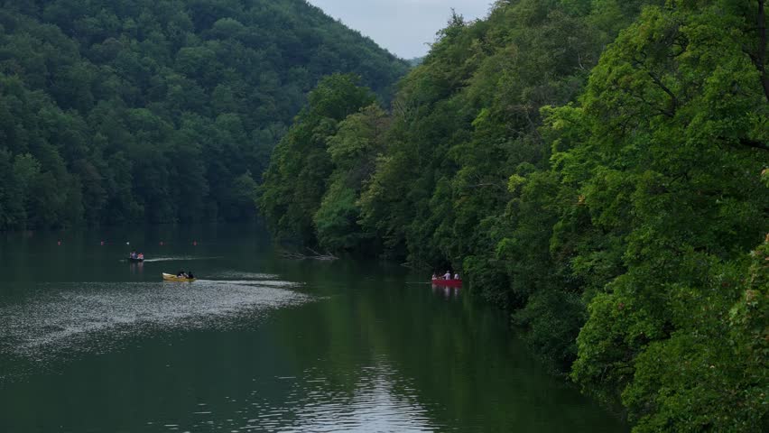 Small rowing boats on mountain lake