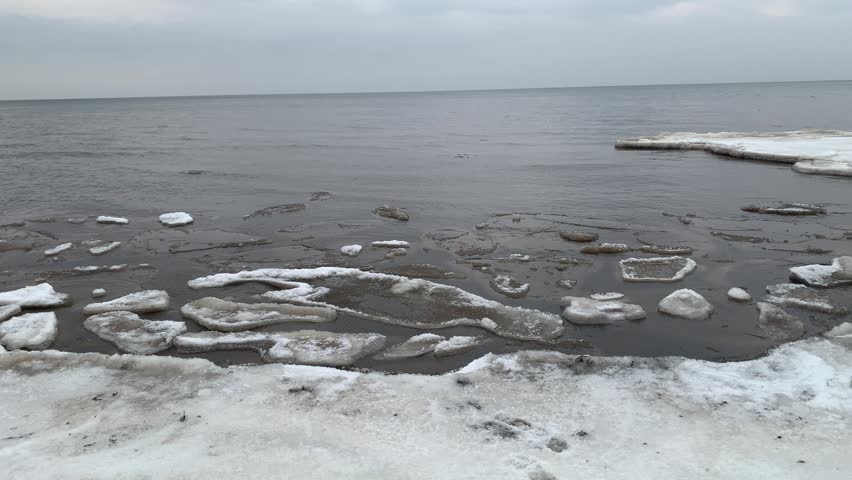 ice floes on the surface of the water of the winter sea