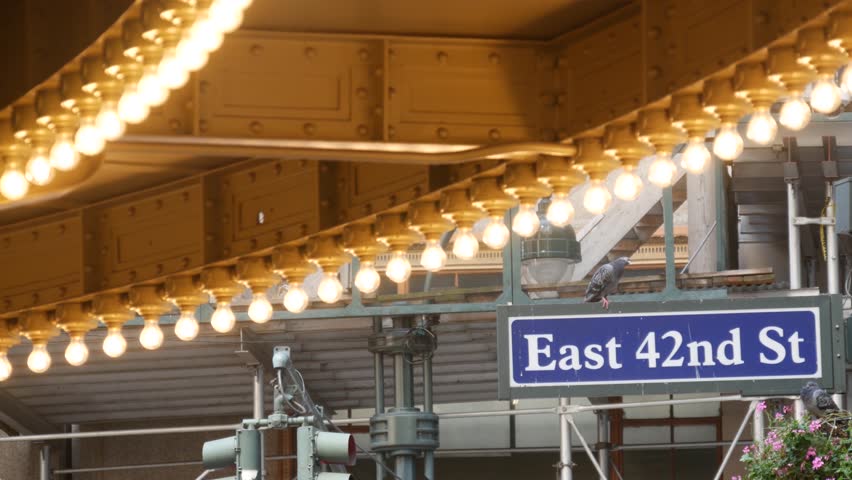 Grand Central Terminal on East 42 street, New York City Manhattan Midtown roadsign. Details of railway building entrance in United States. American public railroad transport. Road sign and light bulbs