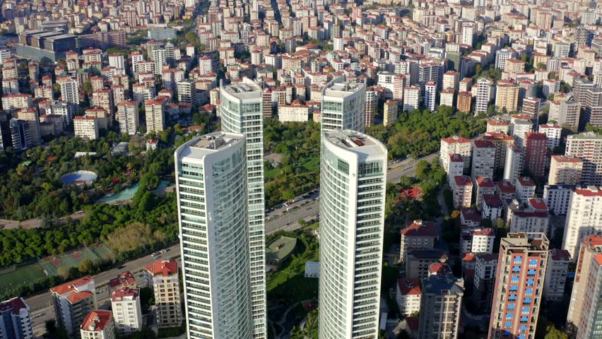 Istanbul featuring modern skyscrapers, high-rise buildings, and expanding urban development. Suitable for real estate, construction, architecture, business, infrastructure, city growth, and urban transformation projects.