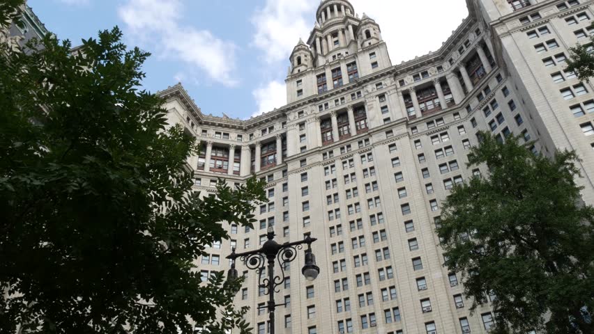 New York City Downtown Civic Center, United States of America. Manhattan municipal building 1914, old historic architecture. Government administration authority. Low angle view from Chambers street