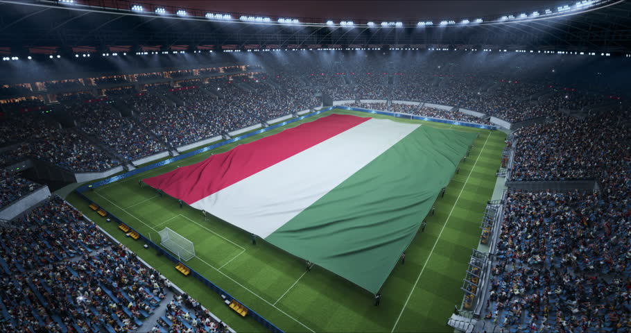 Professional Stadium Soccer Game Championship With Flag of Hungary Spread Across the Pitch Before Football Match Start. Cheering Crowds of Fans Surround the Field. Aerial Elevated Static Wide Shot