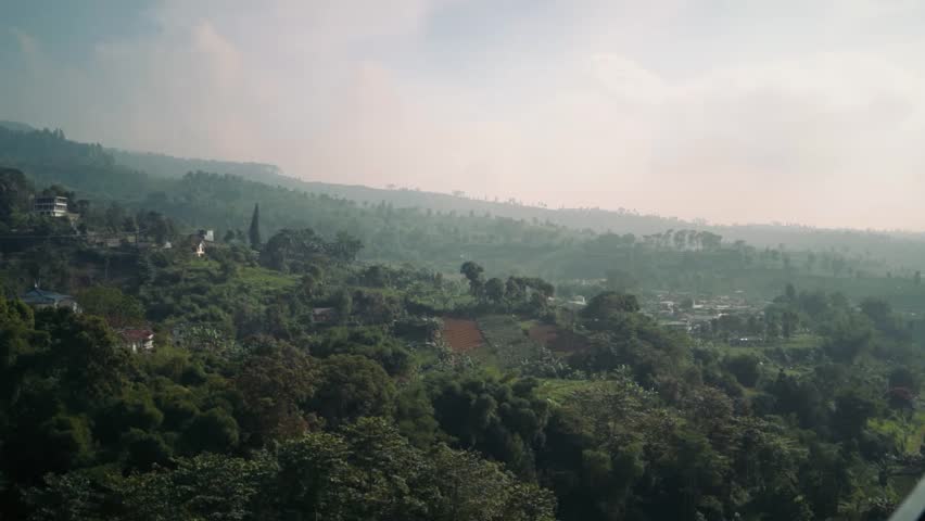 Misty Green Mountain Valley Landscape At Sunrise