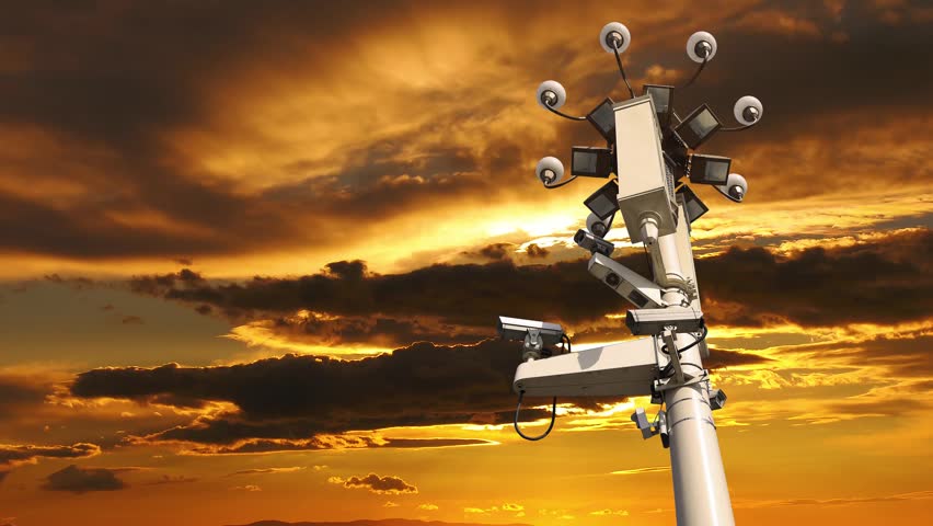 Street lamp on Tiananmen Square in Beijing, China (against the sunset), with propaganda or public announcement speakers. 4K, time lapse  