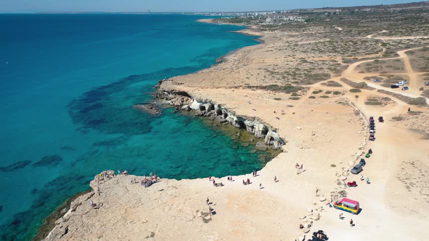 Aerial view of famous Sea Caves in Cape Greco National Park in Cyprus, 4k video