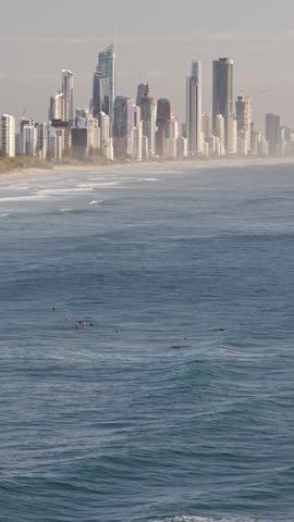 Surfers In Surfers Paradise, Gold Coast, QLD, Australia - Drone, Vertical Shot