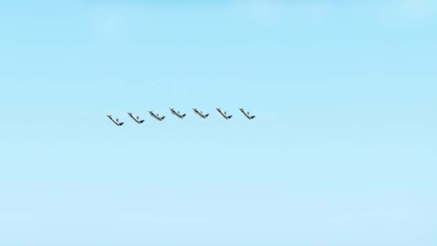 Qatar Flag on Pole, Fighter Jets Smoke Trails in Blue Sky - Low Angle View