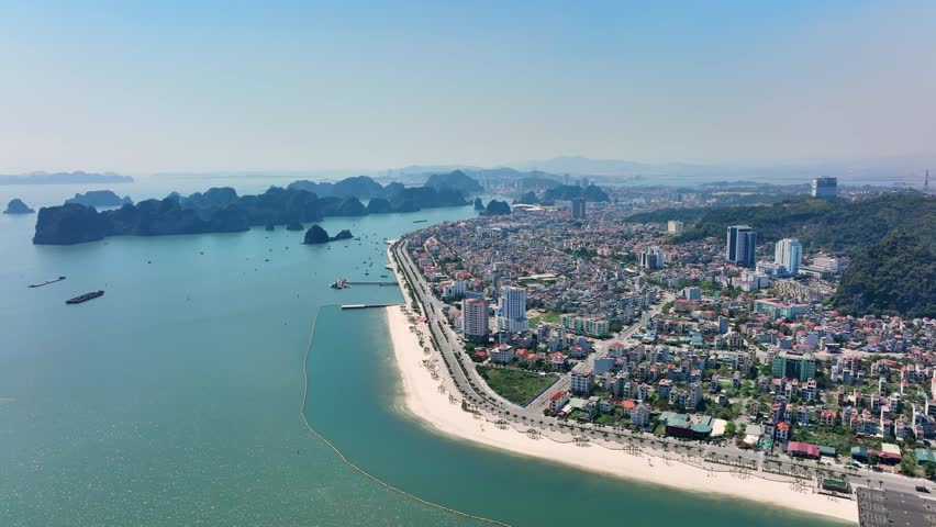 Drone view of Ha Long City waterfront and Ha Long Bay Vietnam