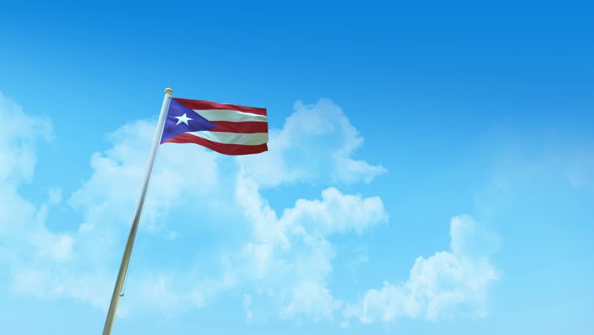 Puerto Rico Flag on Pole, Blue Sky and Clouds - Low Angle View