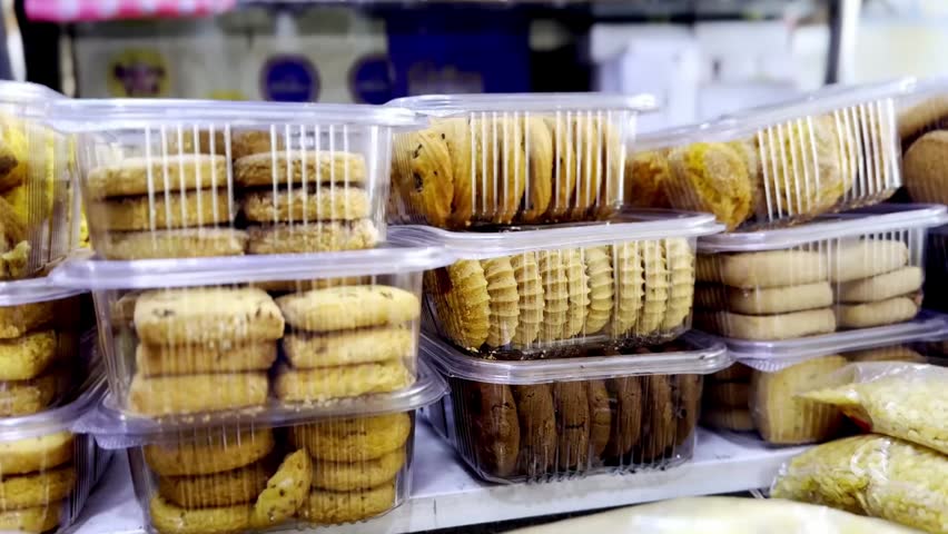 Bakery Shop Displaying Fresh Breads, Cakes and Pastries with Delicious Baked Goods, Retail Interior and Food Business