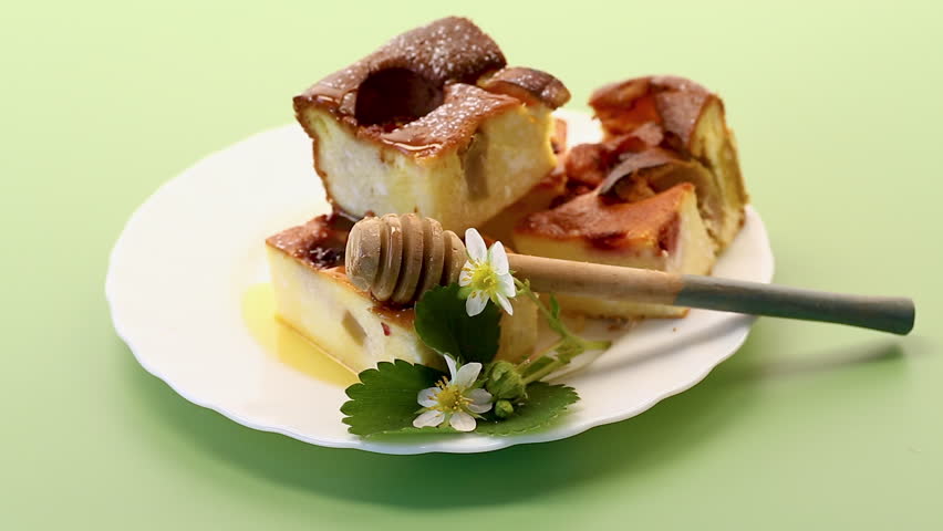 Homemade sweet casserole with strawberries and natural honey.