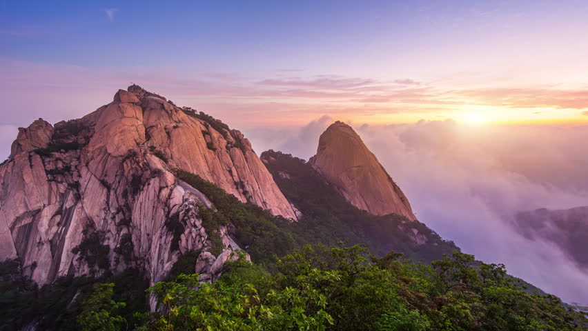 Time lapse of Bukhansan mountains at sunrise, Seoul in South Korea.
