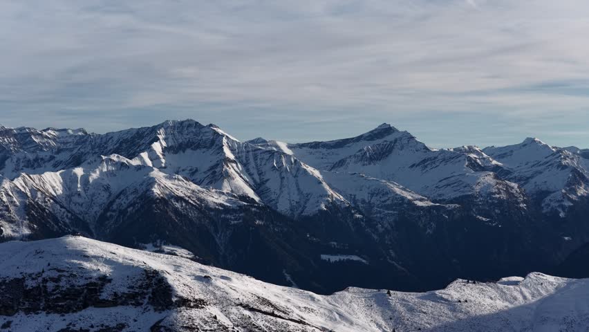 Swiss landscape Lepontine Alps mountains range Switzerland winter snow covered peak