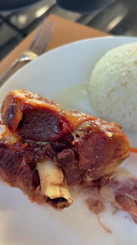 Premium Roasted Goat Meat Served with Rice and Fresh Salad on Elegant Dining Table | Vertical Food Video 4K