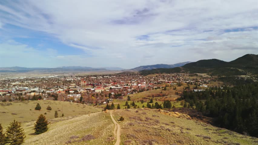 Helena Montana Aerial View With Grassy Hills And Pine Forest